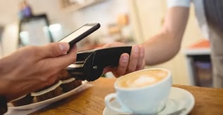 Hand paying with phone