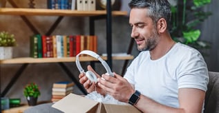 Man putting on headphones