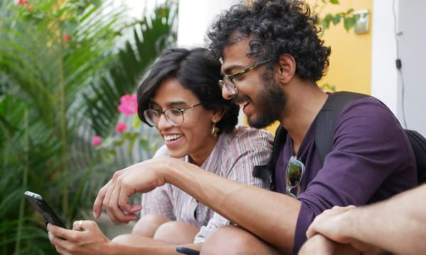 Couple looking at phone